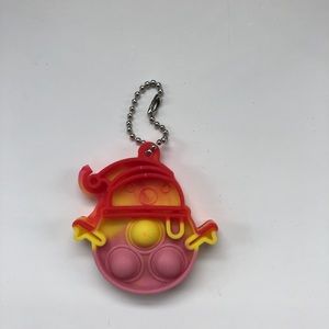 Free with purchase - small snowman pop it keychain